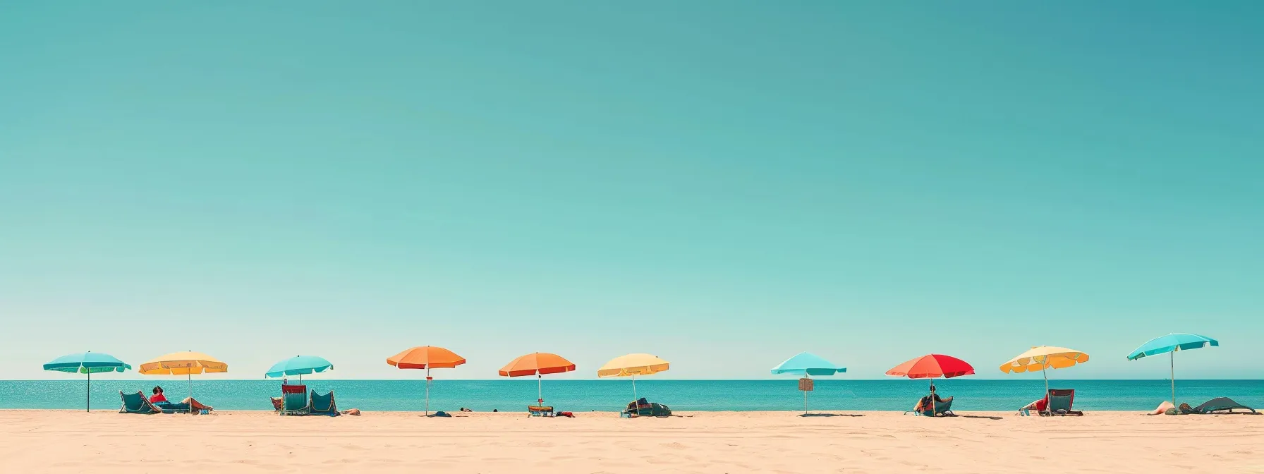 golden sands stretch endlessly under the clear blue sky, where beachgoers lounge under colorful umbrellas and the soothing sound of crashing waves fills the air.